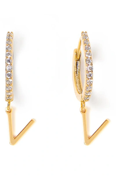 Shop Tess + Tricia Initial Huggie Hoop Earrings In Gold V
