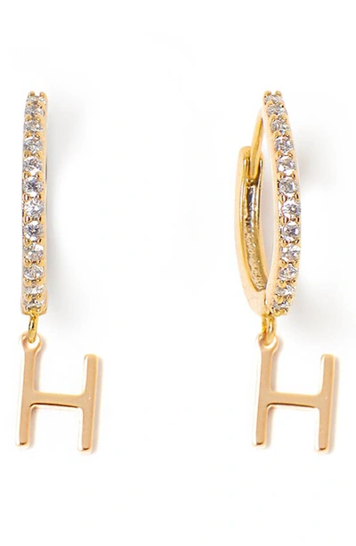 Shop Tess + Tricia Initial Huggie Hoop Earrings In Gold H