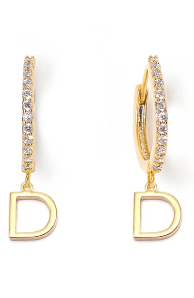 Shop Tess + Tricia Initial Huggie Hoop Earrings In Gold D