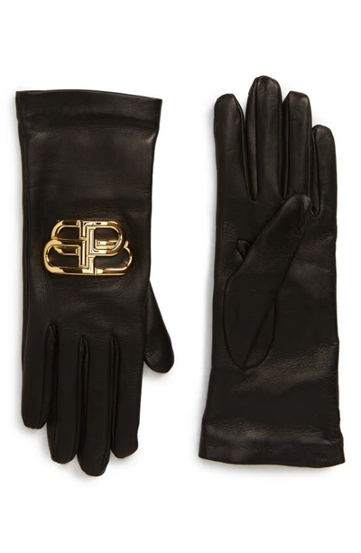 Shop Balenciaga Giant Bb Logo Leather Gloves In Black/ Gold
