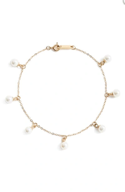 Shop Knotty Imitation Pearl Charm Bracelet In Gold