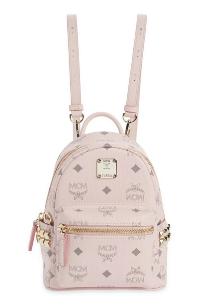 Shop Mcm Mini Stark Stud Coated Canvas Backpack In Powder Pink