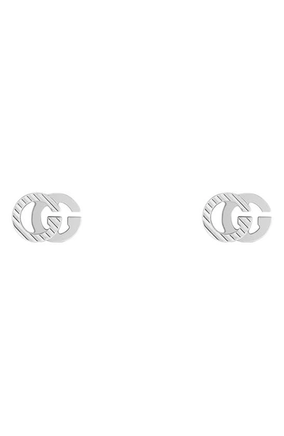 Shop Gucci Running G 18k Gold Stud Earrings In White Gold
