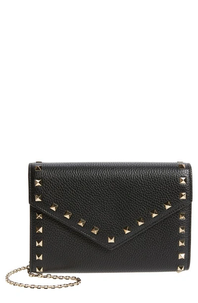 Shop Valentino Rockstud Leather Envelope Wallet On A Chain In Nero