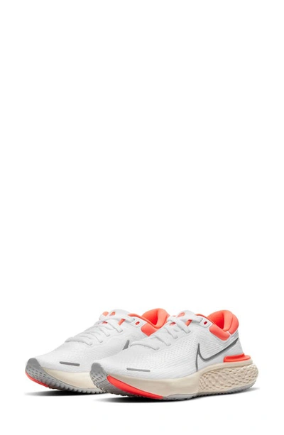 Shop Nike Zoomx Invincible Run Flyknit Running Shoe In White/ Silver/ Bright Mango