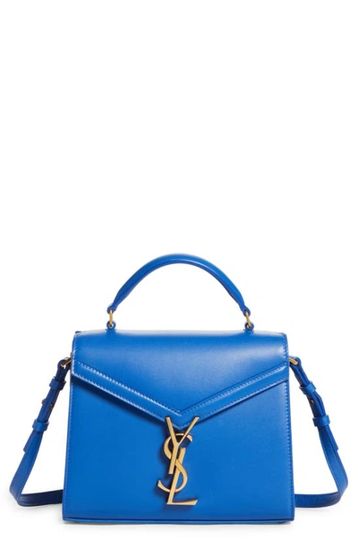 Shop Saint Laurent Mini Cassandra Leather Top Handle Bag In Bleu Majorelle