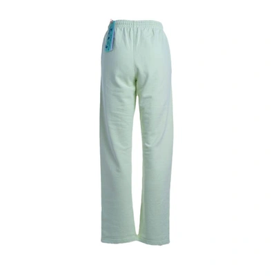 Shop Off-white Trousers In Green - Black