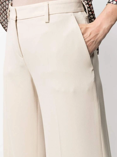 Shop Alberto Biani Trousers Beige