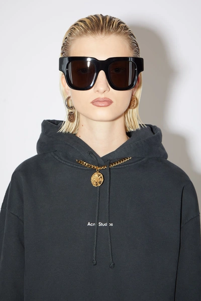 Shop Acne Studios Logo-print Hooded Sweatshirt Black