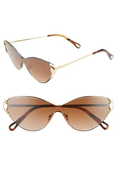 Shop Chloé Curtis 60mm Cat Eye Shield Sunglasses In Gold/ Gradient Brown