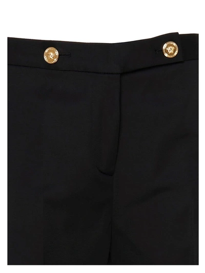 Shop Versace Women's Black Viscose Pants