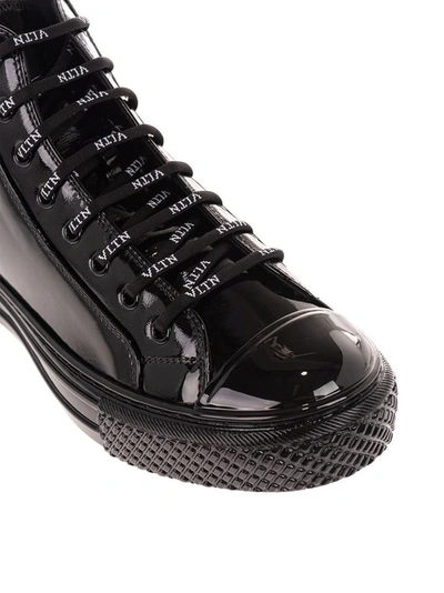 Shop Valentino Garavani Women's Black Leather Hi Top Sneakers