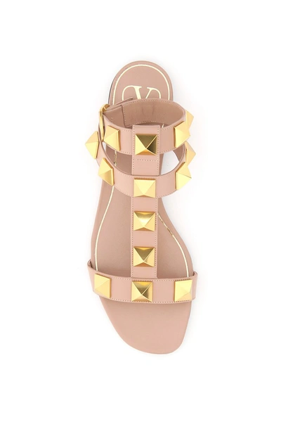 Shop Valentino Garavani Flat Roman Stud Sandals In Rose Cannelle