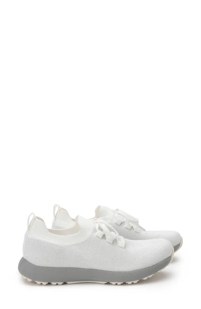 Shop Traq By Alegria Alegria Froliq Water Resistant Knit Sneaker In Zesty White Fabric