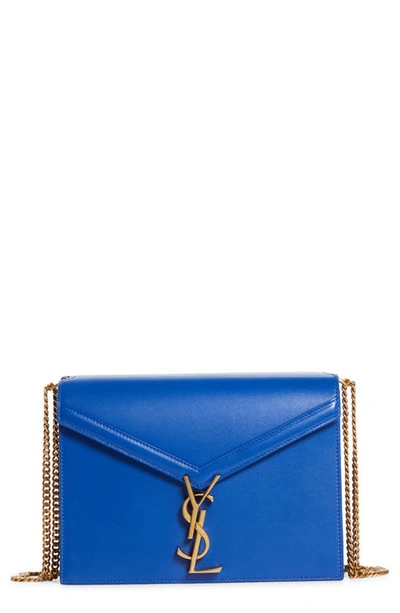 Shop Saint Laurent Medium Cassandra Monogram Calfskin Envelope Bag In Bleu Majorelle