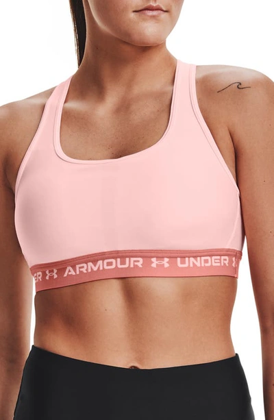 Shop Under Armour Heatgear(r) Mid Cross Back Sports Bra In Beta Tint / Stardust Pink