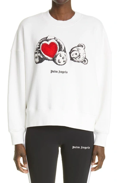 Shop Palm Angels Bear In Love Graphic Applique Sweatshirt In Brilliant White White