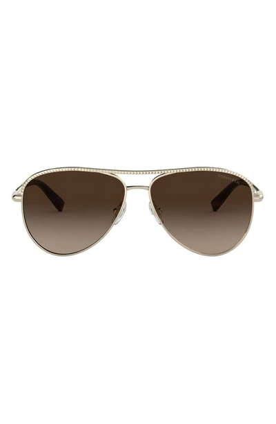 Shop Tiffany & Co 57mm Aviator Sunglasses In Pale Gold Gradient