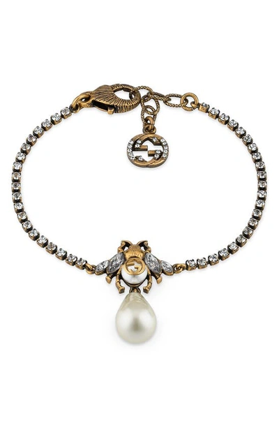 Shop Gucci Gg Bee Imitation Pearl Bracelet In Gold
