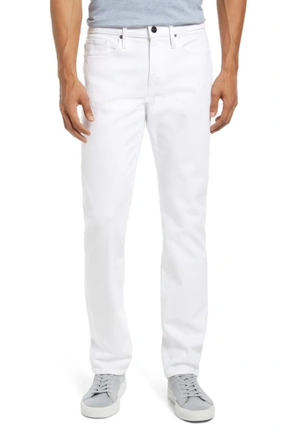 Shop Frame L'homme Athletic Slim Fit Jeans In White