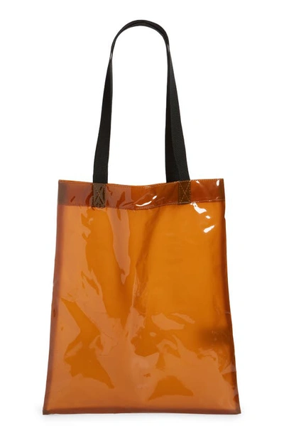 Shop Rains Transparent Shopper In Shiny Amber