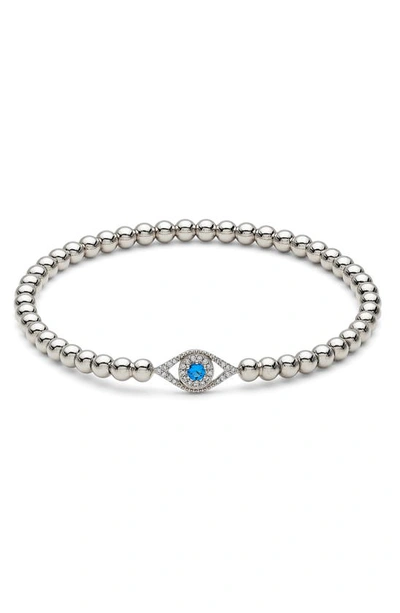 Shop Nadri Evil Eye Beaded Stretch Bracelet In Rhodium