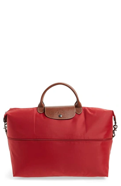 Shop Longchamp Le Pliage 21-inch Expandable Travel Bag In Deep Red