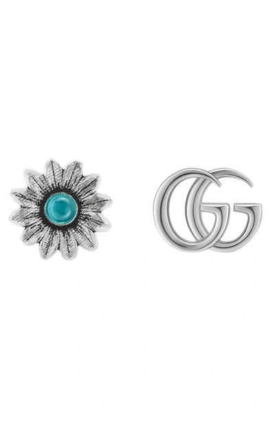 Shop Gucci Mismatched Flower And Gg Stud Earrings In Silver