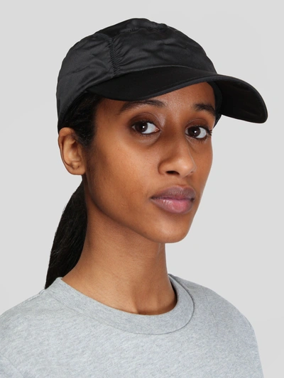 Shop Ganni Ruched Cap In Black