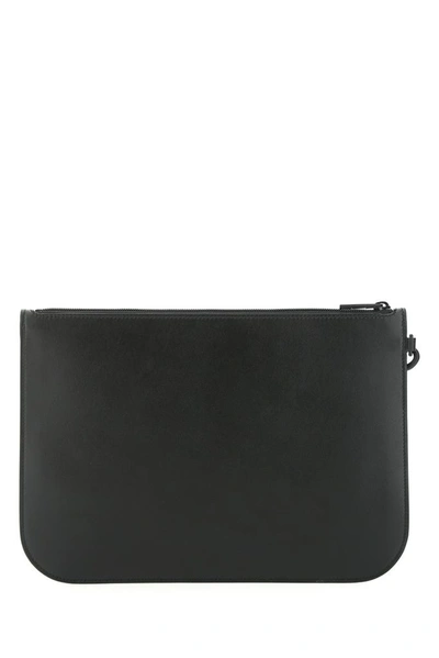 Shop Alexander Mcqueen Logo Printed Clutch Bag In Black