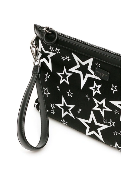 Shop Dolce & Gabbana Star Printed Clutch Bag In Black