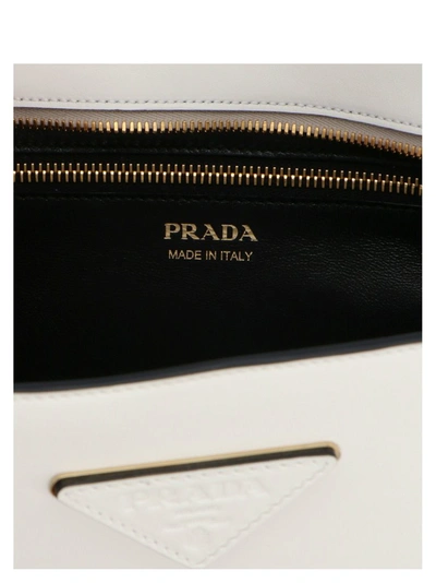 Shop Prada Logo Plaque Clutch Bag In White