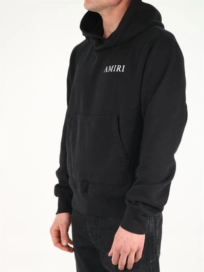 Shop Amiri Logo Print Hoodie In Black