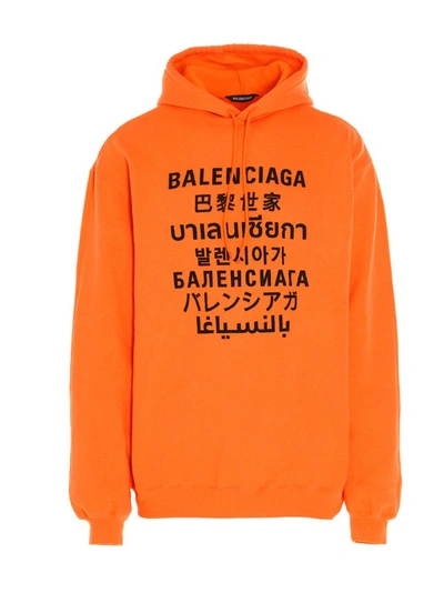 Shop Balenciaga Languages Print Hoodie In Orange