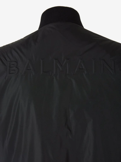 Shop Balmain Logo Embossed Reversible Bomber Jacket In Multi