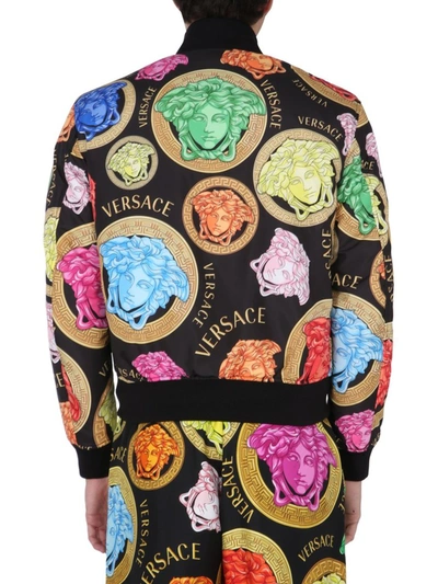 Shop Versace Reversible Bomber Jacket In Multi