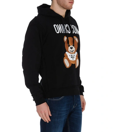 Shop Moschino Inside Out Teddy Hoodie In Black