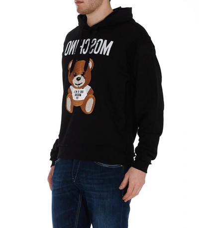 Shop Moschino Inside Out Teddy Hoodie In Black