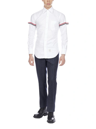 Shop Thom Browne Pinstriped Pants In Navy