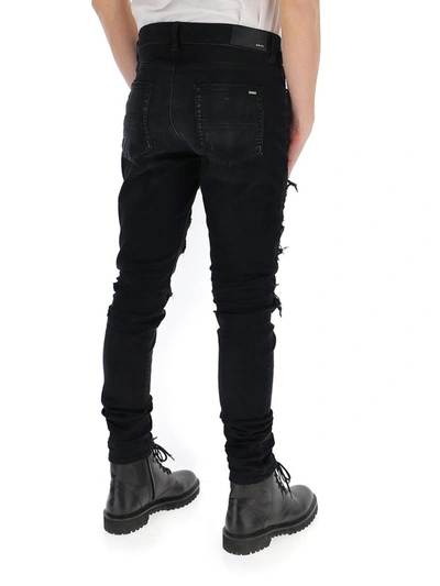Shop Amiri Distressed Slim Leg Jeans In Black