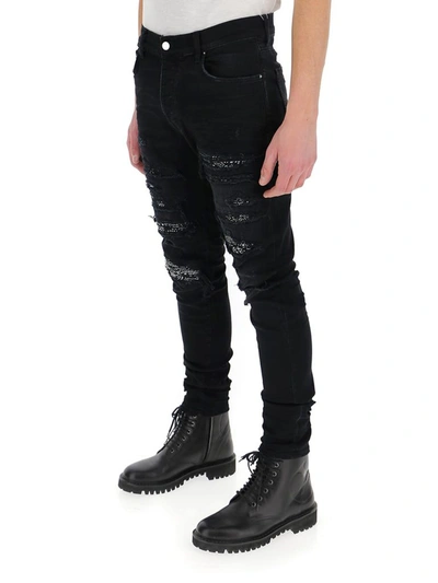 Shop Amiri Distressed Slim Leg Jeans In Black