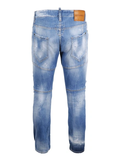 Shop Dsquared2 Ripped Straight Leg Jeans In Blue