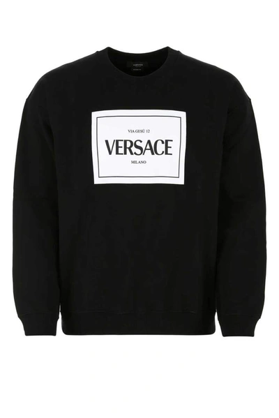 Shop Versace Logo Printed Sweatshirt In Black