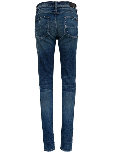 Shop Amiri Distressed Denim Jeans In Blue