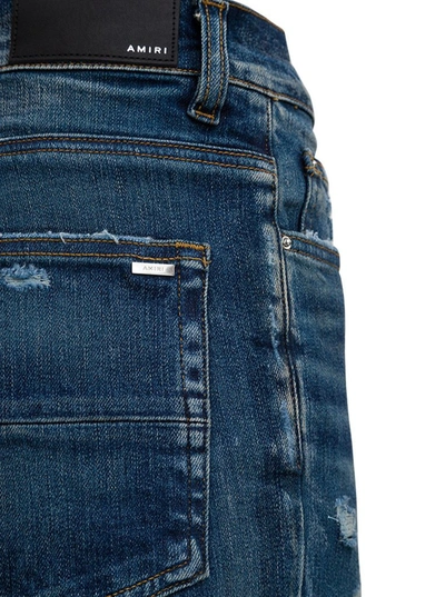 Shop Amiri Distressed Denim Jeans In Blue
