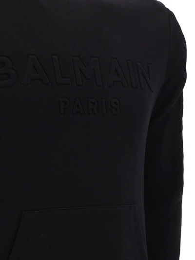 Shop Balmain Logo Embossed Sweatshirt In Black