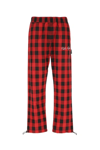 Shop Palm Angels Buffalo Check Pants In Red