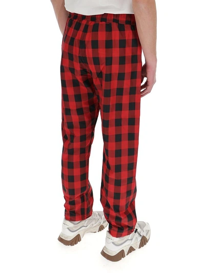 Shop Palm Angels Buffalo Check Pants In Red
