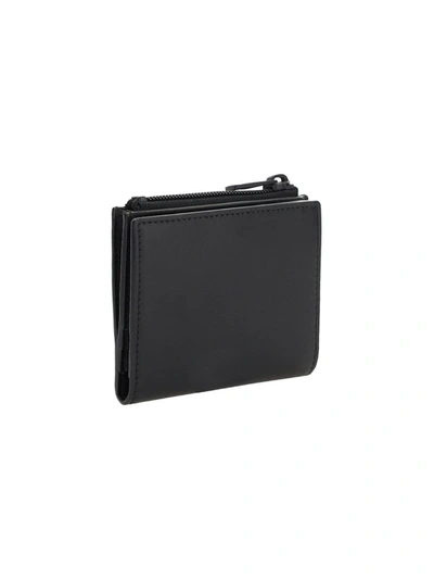 Shop Alexander Mcqueen Logo Zipped Wallet In Black