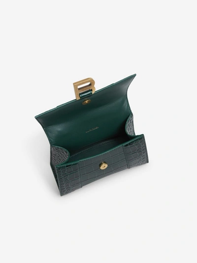 Shop Balenciaga Hourglass Xs Top Handle Bag In Green